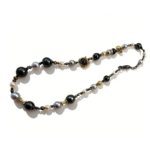 Luxury necklace featuring lustrous seawater pearls, Tahitian black pearls, and silver gold-plated decorative accents, elegant statement jewelry