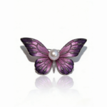 Elegant freshwater pearl butterfly brooch with gradient purple enamel wings, crystal accents, and gold-toned metal frame, luxury jewelry accessory