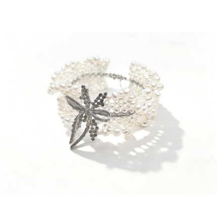Laurel Bow freshwater pearl cuff bracelet with 925 sterling silver plated CZ bow centerpiece, multi-strand pearl statement bracelet